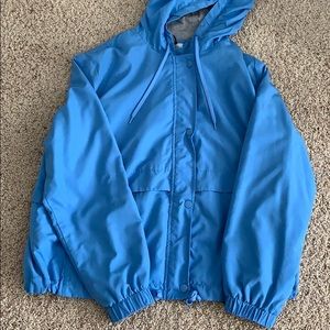 Light blue windbreaker, basically brand new